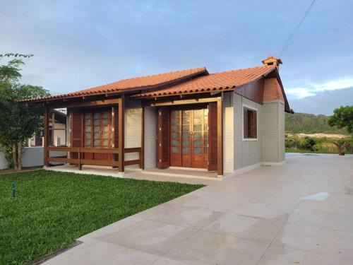 Ararangua House | Casa Bromelias Paiquere