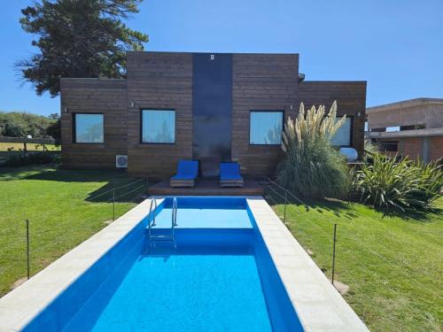 Sierra de la Ventana Ski Chalet | Casa Cortés Golf - Boutique