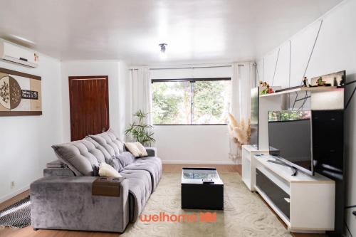 Petropolis House | Casa em Passo Fundo com Churrasqueira