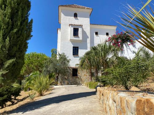 Alozaina Apartment | Castle Tower apartment in rural holiday park 'Bernard'
