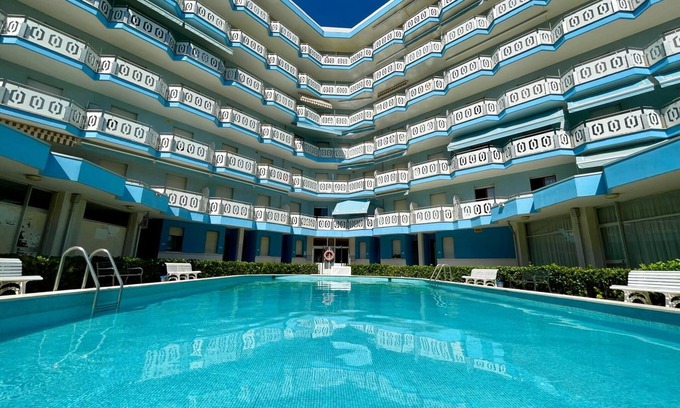 Porto Santa Margherita Apartment | Central apartment with shared pool