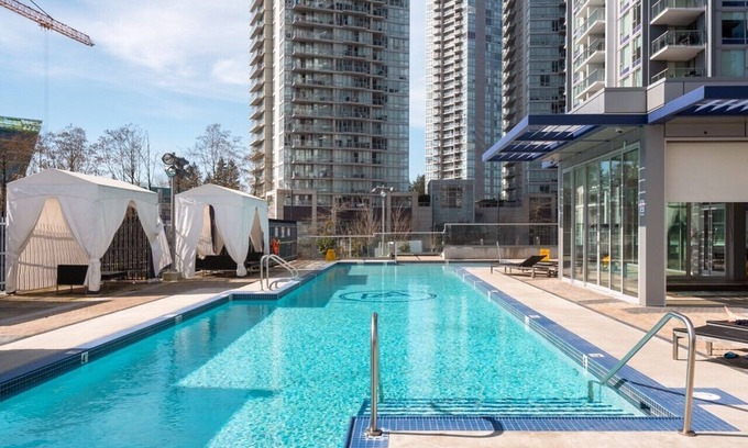 Surrey Condo | Centrally located, 30 plus floor Rocky Mountains view 1 BR Condo