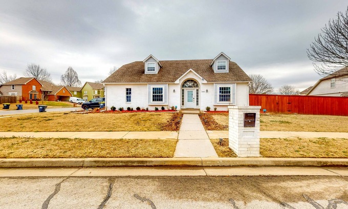 Jenks House | Centrally located home w/ a wood-burning fireplace