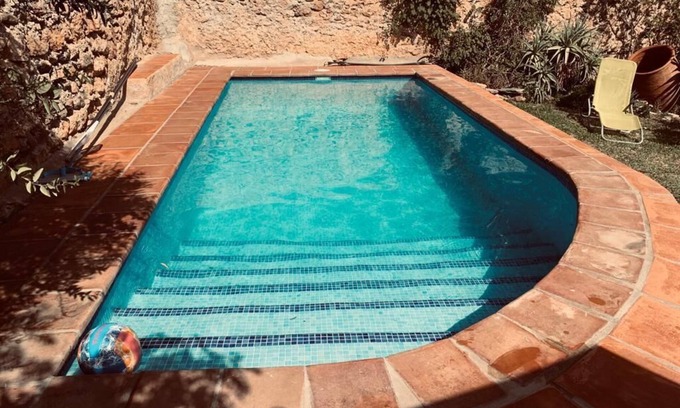 Agustinos House | Century-old olive mill has a unique style with open and light spaces