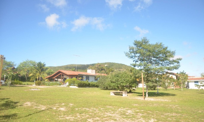 Cruzeiro House | Chácara do Amparo: Large green area close to everything