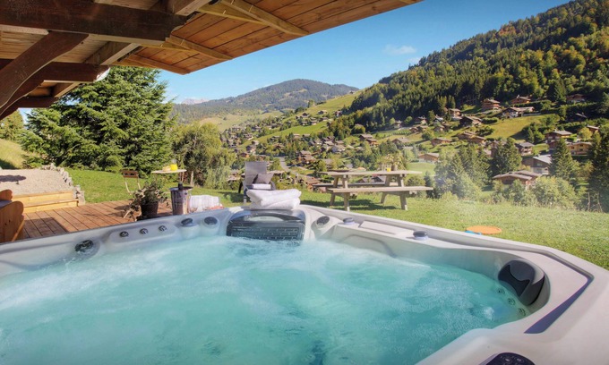 La Clusaz Ski Chalet | Chalet Batieu - ski-in ski-out holiday for 14 spa & views - OVO Network