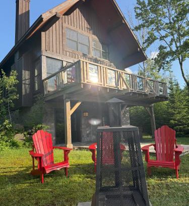 Lac Superieur Village Ski Chalet | Chalet Inukshuk Luxury Log Cabin with Spa Lake View and Club Access near Mont Tremblant