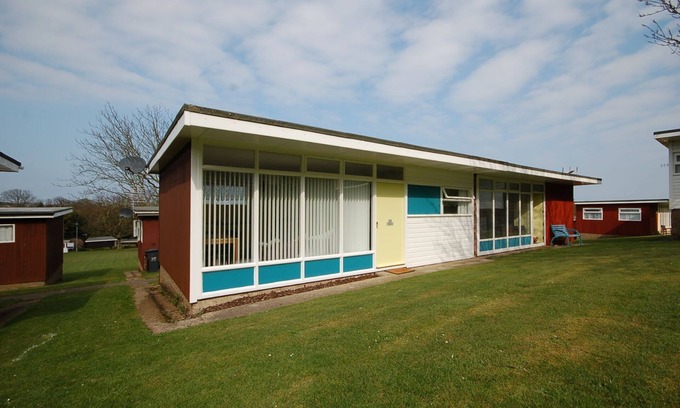 Cromer Ski Chalet | Chalet with open planned kitchen/living area, benefiting from direct access to fantastic cliff walks