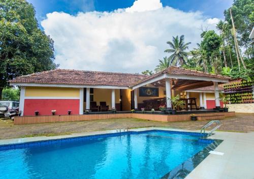 Gudalur Resort | Chandragiri Heritage Bungalow By ZOMESTAYS