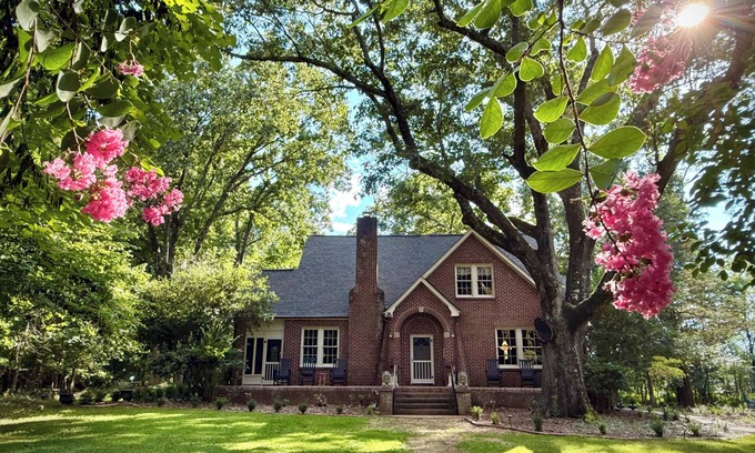 Steele Creek House | Charming 1930's English cottage with historic ambiance on three private acres