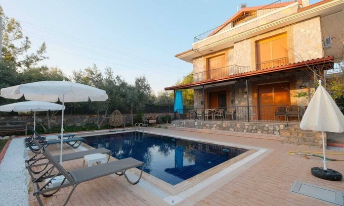 Fethiye House | Charming 4-bedroom estate with WiFi, swimming pool and AC in enchanting Fethiye