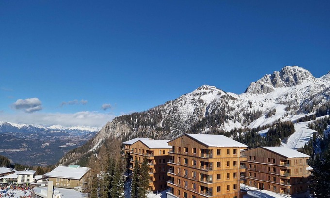 Passo Pramollo Apartment | Charming apartment right on the piste