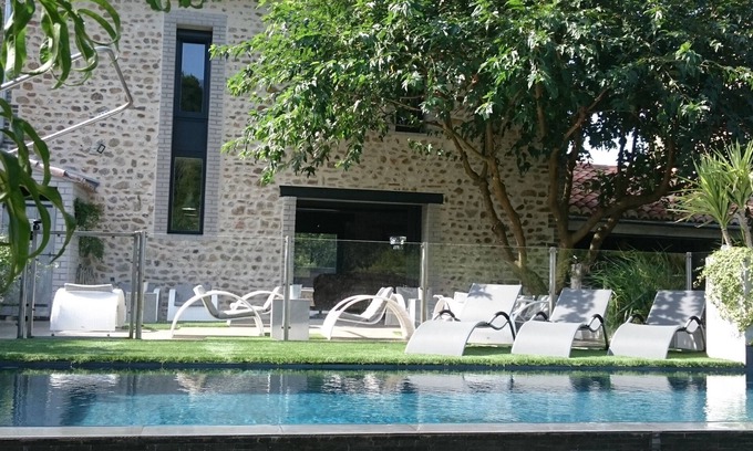 Cardet House | Charming barn renovated workshop style . Heated swimming pool