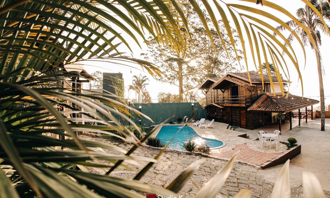 Mairipora Cottage | Charming, Cabana-style country house with pool and comfortable suites
