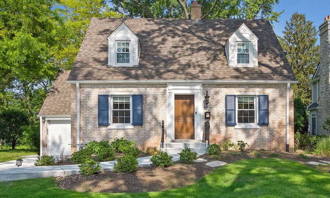 Wheaton House | Charming Cape Cod inspired home offering comfort and style for your time away.