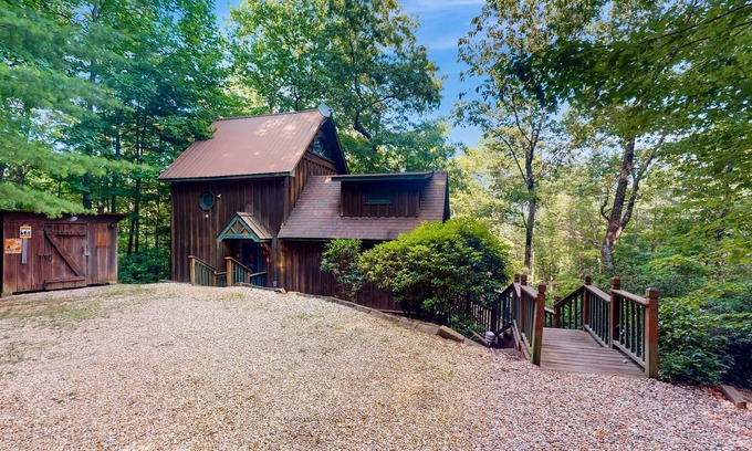 Raccoon Ridge Cabin | Charming, dog-friendly cabin with a private hot tub, outdoor fireplace, & yard