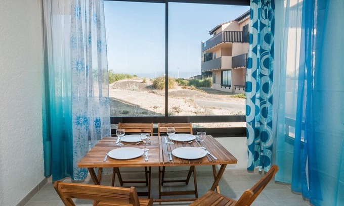 Lacanau-Ocean Apartment | Charming flat for 4 people on the ground floor, small view of the sea.