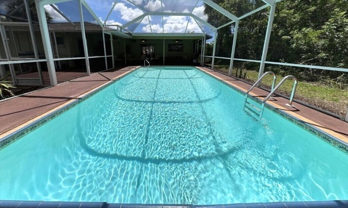Port Charlotte House | CHARMING HOME-CANAL FRONT-BOAT SLIP-SPACIOUS HEATED POOL/LANAI-NEAR BEACH/SHOPS!