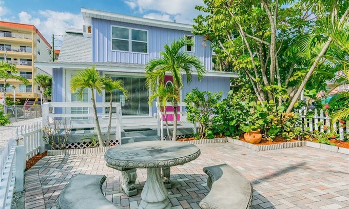 Madeira Beach Cottage | Charming Upstairs Unit in a Cottage, steps to the beach. Across from John's Pass
