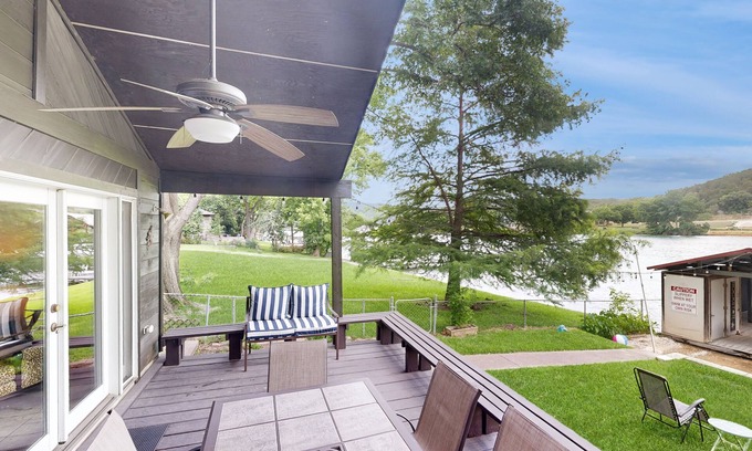 Saratoga Point House | Chic home on Lake Austin with dock, lovely deck, vibrant interior & views