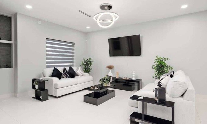 McAllen House | Chic Monochrome Living: Where Style Meets Comfort