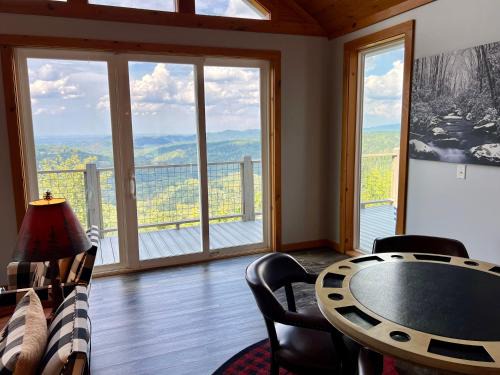 Chalet Village North House | Close Enough to Perfect Luxurious 4 Bedroom Cabin with Game Room & Stunning Views