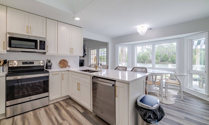 Talahi Island House | Coastal Chic Waterfront Island Living w/Yard + Parking by Lucky Savannah