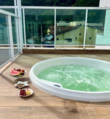 Praia Grande Apartment | Cobertura Santorini Nova com Spa e Solário na Praia Grande