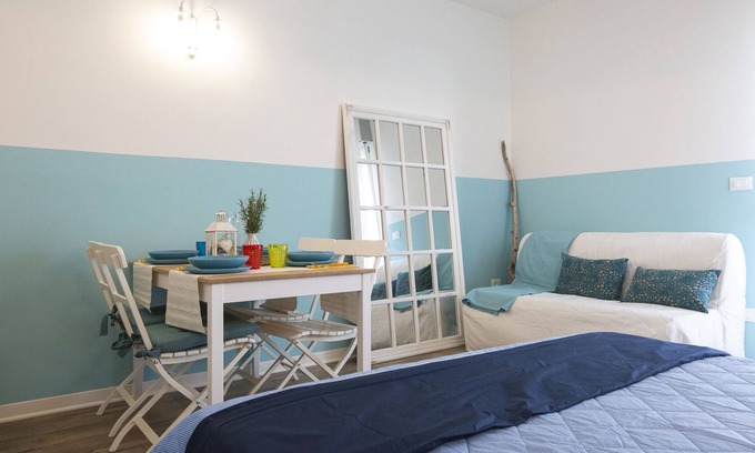 Caorle Apartment | Colourful modern studio by the sea