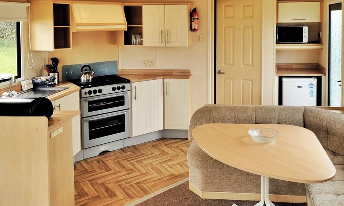 Ludchurch House | Comfortable and spacious 12ft-wide caravan with one double and one twin.