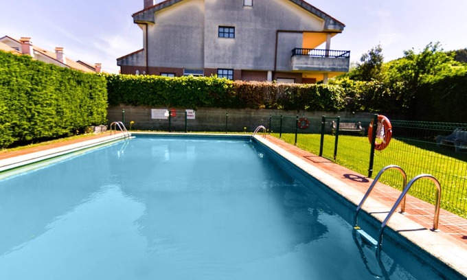 Miengo Villa | Comfortable and spacious villa with communal swimming pool