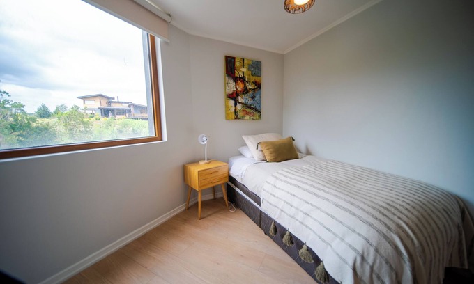 Puerto Varas Apartment | Comfortable apartment steps away from Llanquihue Lake in Puerto Varas.