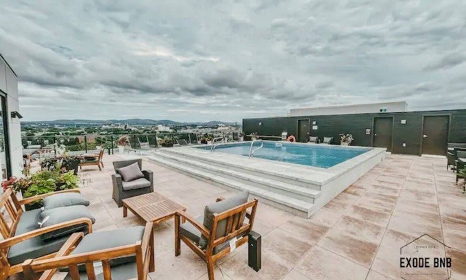 Saint-Roch Apartment | Condo - 305 | Swimming pool | Terrace with a view