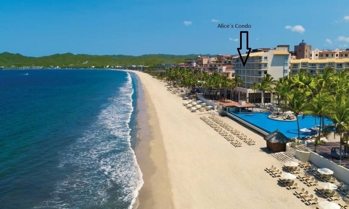 Las Glorias Condo | Condo at front of the beach inside a Resort compound hotel.