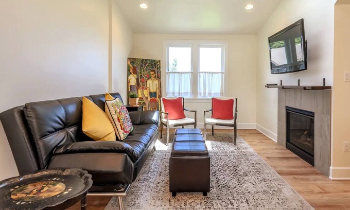 Uptown Apartment | Convenient, walkable apartment with fireplace, washer/dryer, & full kitchen