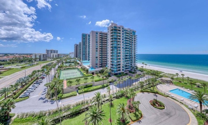 Sand Key Condo | Corner condo overlooking the beach and bay. Secluded beach.