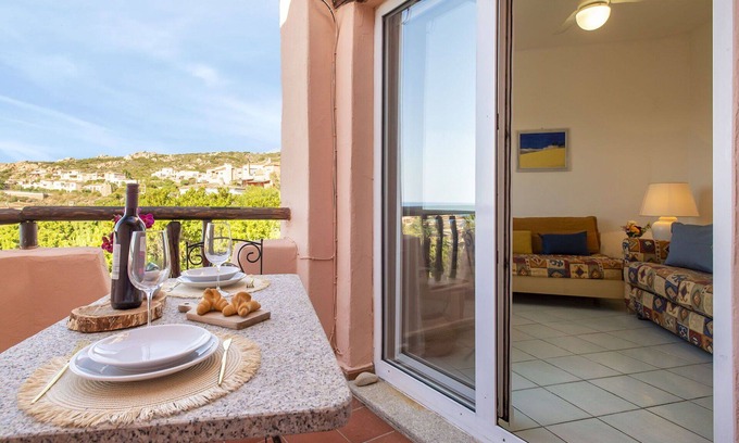 Canneddi Apartment | Cosy apartment for 4 people with A/C, WIFI, pool, TV, terrace and pets allowed