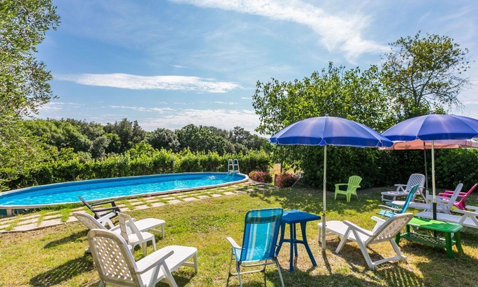 Follonica Villa | Cosy apartment in villa for 12 people with private pool, WIFI, TV, patio and pets allowed