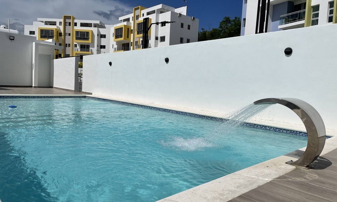 Guaricano Apartment | Cozy Apartment with Pool View 10 minutes USA Embassy