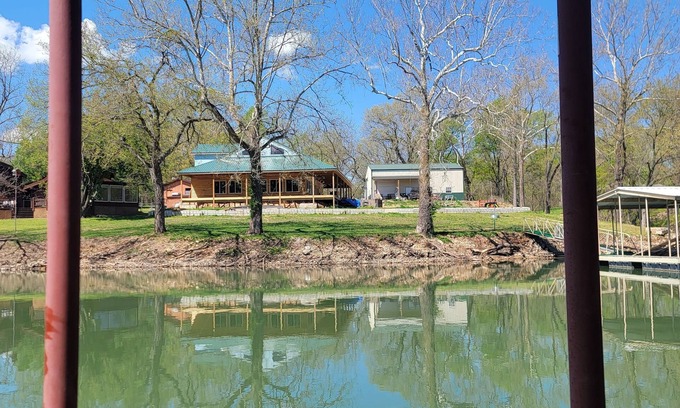 Grove Cabin | Cozy cabin in delightful Grove with boat dock and slip, WiFi, AC, and wood stove