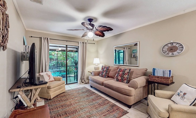 Ocean Woods Condo | Cozy condo with private patio, shared pool, sauna, grill, wifi and W/D