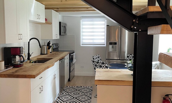 Township of Woolwich House | Cozy Cottage Style House by Grand River