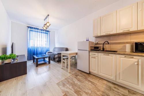 Rzeszow Apartment | Cozy New Town Apartment- City Centre Rzeszow by StayNest