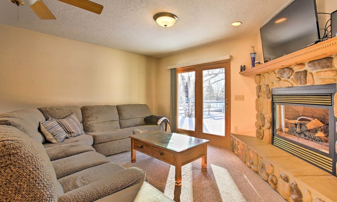 Houghton Lake House | Cozy Riverfront Home w/Fire Pit in Houghton Lake!