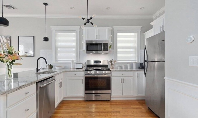 South Boston Condo | Cozy Southie Condo with Fireplace and Private Roof Deck