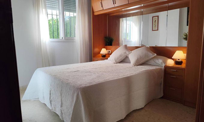 El Morche Apartment | Cupid Beach El Morche. Patio, Coast, Sea and Beach.