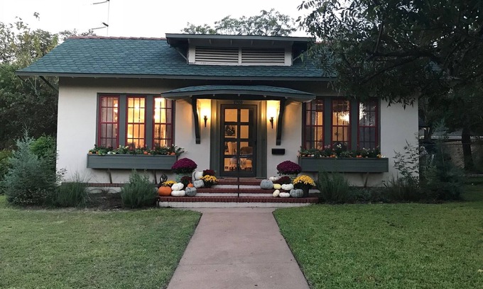 Austin Ave. House | Curated boutique stay in a 1920s English bungalow. Modern twist on a classic!