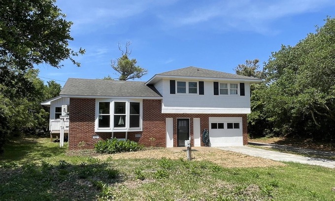 Buxton Cottage | Cypress Cove, situated in Buxton on a soundfront lot, provides a peaceful setting in this charming rental cottage.