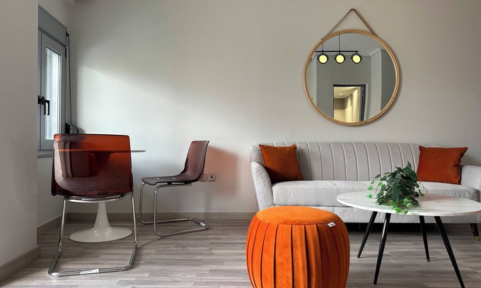 Petralona Apartment | D150 Orange is the new black