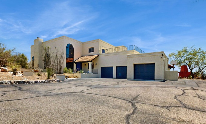 Tucson House | Dazzling retreat with city views, pool, hot tub, bocce ball court, & roof deck